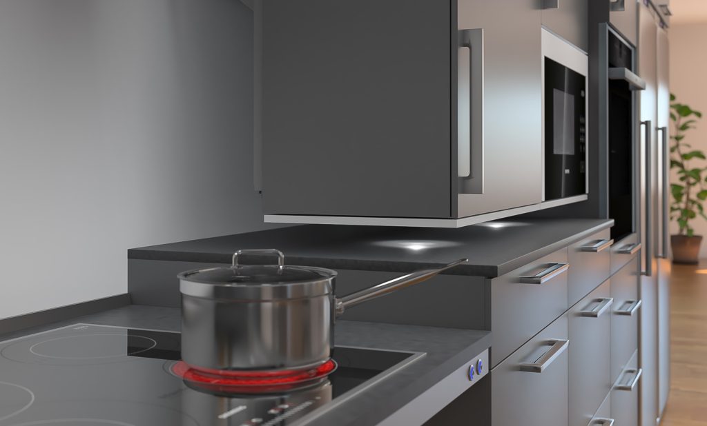 Küchenschrank Diago für barrierefreie Küchen. Der gesamte Oberschrank mit Mikrowelle senkt sich bis auf die Arbeitsplatte schräg nach vorn. Hummel-Küchen